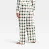 Women's Plaid Ribbed Holiday Matching Family Pajama Pants - Wondershop™ Cream